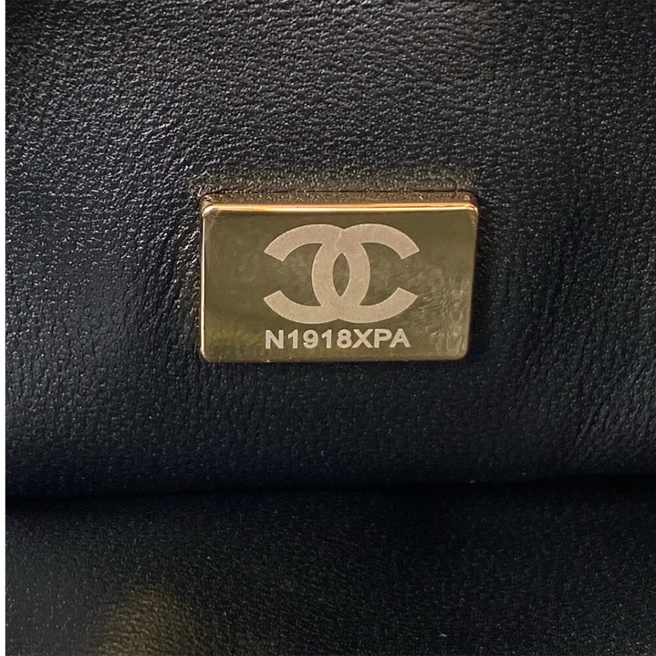 Ch*el mini flap with top handle